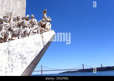 Discoveries monument and 25 april bridge Lisbon Portugal Stock Photo