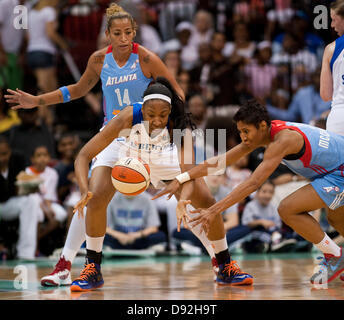June 9, 2013 - Newark, New Jersey, U.S. - June 9 2013: Liberty's forward/center Kelsey Bone (3) and Dream's guard/forward Angel McCoughtry (35) battle for a lose ball in the first half during WNBA action at the Prudential Center in Newark, New Jersey between the New York Liberty and the Atlanta Dream. The New York Liberty defeated the Atlanta Dream 76-67. Stock Photo