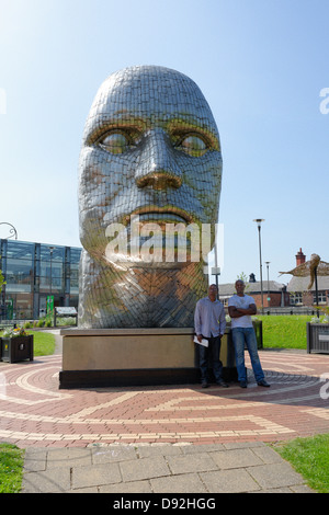 The Face of Wigan - modern sculpture statue by Rick Kirby in 2008 erected in the Wigan town centre. Stock Photo