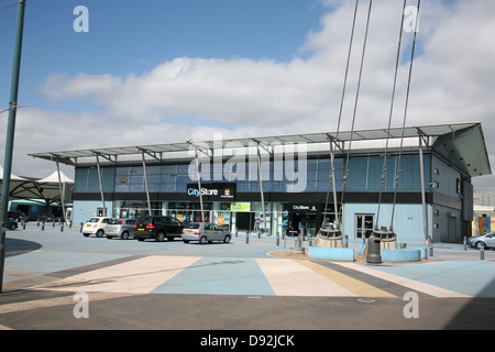 Etihad (formerly the City of Manchester) Stadium, home of Manchester City FC with old crest displayed Stock Photo