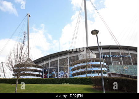 Etihad (formerly the City of Manchester) Stadium, home of Manchester City FC with old crest displayed Stock Photo