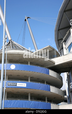 Etihad (formerly the City of Manchester) Stadium, home of Manchester City FC with old crest displayed Stock Photo