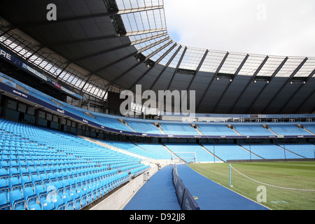 Etihad (formerly the City of Manchester) Stadium, home of Manchester City FC with old crest displayed Stock Photo