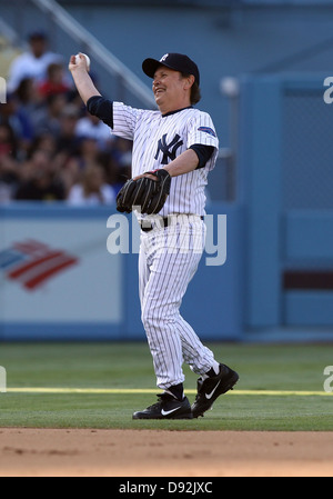 LOS ANGELES, CA - JUNE 08: Actor Billy Crystal plays for the New York Yankees against the Los Angeles Dodgers in an Old Timers Stock Photo