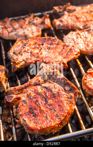 Steak on grill fire-toasted Stock Photo