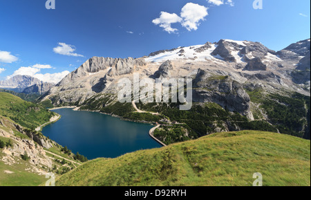 summer view of mount Marmolada and Fedaia lake, Trentino, Italy Stock Photo