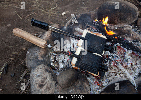Two toasted sandwich makers on the campfire in Jindabyne, New South Wales, Australia Stock Photo