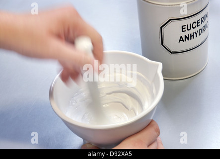 Pharmacist mixing skin cream Stock Photo