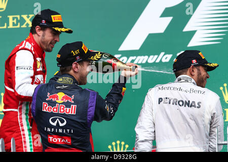 Montreal, Canada. 9th June 2013.  top three on the podium (L-R)Fernando Alonso (ESP), Scuderia Ferrari (2nd), Sebastian Vettel (GER), Infiniti Red Bull Racing (race winner and Lewis Hamilton (GBR), Mercedes AMG Petronas F1 Team (3rd) - Formula1 World Championship 2013 - Round 07 at Circuit Gilles Villeneuve, Montreal, Canada - Sunday 09th June 2013 Credit:  dpa picture alliance/Alamy Live News Stock Photo