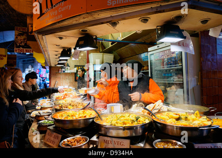 customers ordering food at a fast food restaurant in ...