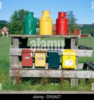 Mailboxes and milk cans, Sweden. Stock Photo