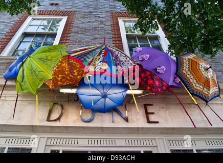 Umbrellas on a shop sign, Dune Hair and Beauty salon, Haven Road, Poole, Dorset, England Stock Photo