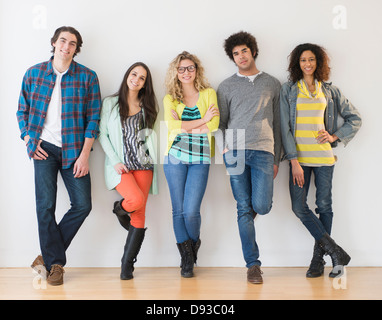 Friends smiling together Stock Photo