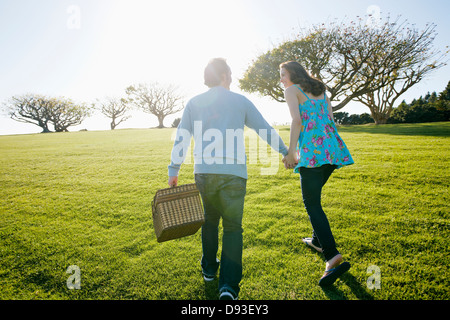 Couple having picnic in park Stock Photo