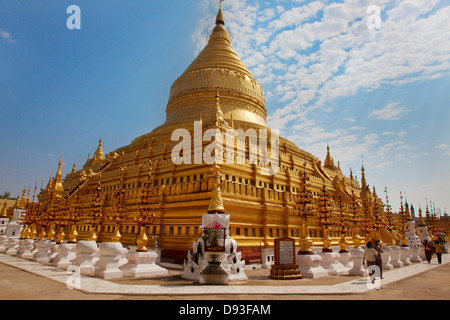 The GILDED SHWEZIGON PAGODA or PAYA was completed in 1102 AD by King Kyansittha - BAGAN, MYANMAR Stock Photo