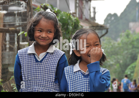 Young girls in uniform on the way to school Darjeeling, West Bengal, India Stock Photo