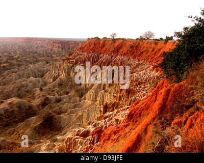 This image captures the dramatic landscape of the Angola mountains, featuring steep cliffs, outcrops, and rugged terrain, characteristic of the region's natural beauty. Stock Photo