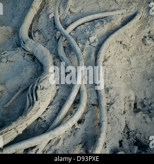 Pipes covered with cement, close-up Stock Photo