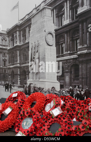 Real remembrance wreaths on the ground at the foot of a black and white vintage era photograph that shows the Cenotaph, currently hiding the real monument being renovated in London's Whitehall. In a landscape of false perspective and confusing juxtapositions between reality and the reproduction of the picture, we see the famous war memorial in central London. Stock Photo