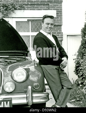 MATT MONRO (1930-1985) UK singer about 1960 with his Jaguar car Stock Photo