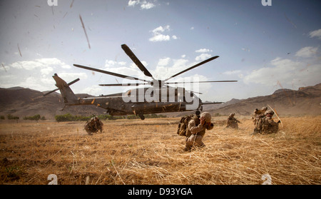 US Marines exit a CH-53E Super Stallion during a clearing operation part of Operation Nightmare June 6, 2013 in Nowzad, Afghanistan. Stock Photo