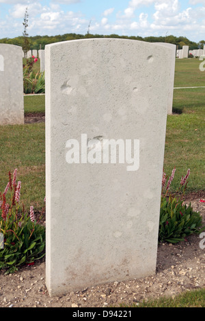 World War Two bullet holes on a headstone in the Australian National Memorial,  Villers-Bretonneux,  Somme, Picardie, France. Stock Photo