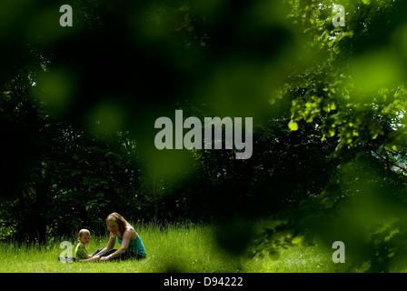 A mother and her child  in a meadow, Sweden. Stock Photo