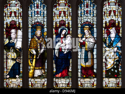 Stained glass window in St. Mary the Virgin Parish Church, Axminster, Devon, England, UK Stock Photo