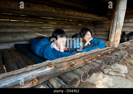 Two female tourists in shelter Stock Photo