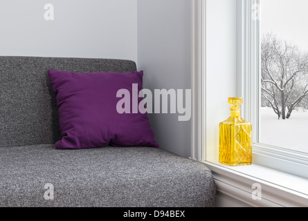 Room with bright decor and view over winter landscape. Stock Photo
