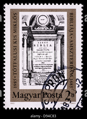 Postage stamp from Hungary depicting the Totfalusi Bible, printed by Nicolas Totfalusi Kis in 1685. Stock Photo
