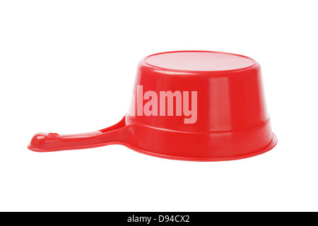 Inverted Red Plastic Scoop On White Background Stock Photo