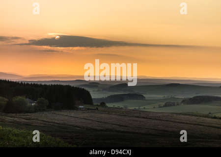 Sunsrt over the Scottish Borders from the A68, at Carter Bar, border with England. Stock Photo