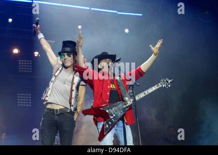 Jun 6, 2013: Kenny Alphin and John Rich of Big and Rich entertain their fans. Thunder on the Mountain at Mulberry Mountain in Ozark, AR. Richey Miller/CSM Stock Photo