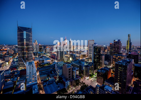 The lights of the city come on after sundown in Melbourne, Australia. Stock Photo