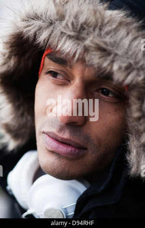Portrait of Man Outdoors with Headphones on his Neck, Mannheim, Baden-Wurttemberg, Germany Stock Photo