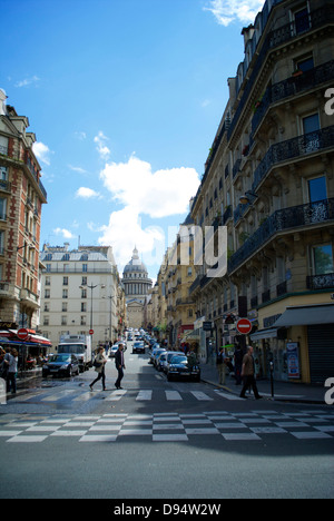 People crossing Parisian street with the Pantheon in the background Stock Photo