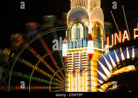 Ferris wheel in motion at Luna Park at night, Sydney, Australia Stock Photo