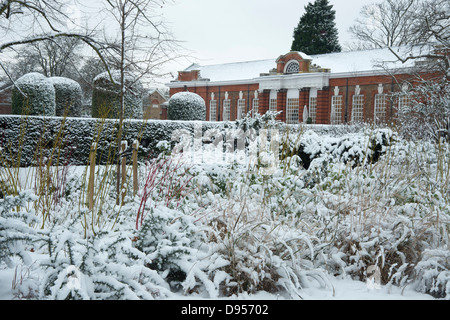 Snow covered plants in front of the Orangerie in Kensington Gardens, London, UK Stock Photo