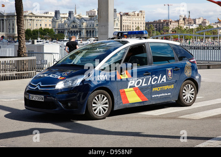 policia fronteras border police patrolling port of barcelona catalonia spain Stock Photo