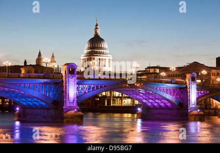 Southwark Bridge and St. Pauls at Dusk London UK Stock Photo