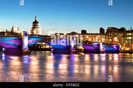 Southwark Bridge and St. Pauls at Dusk London UK Stock Photo