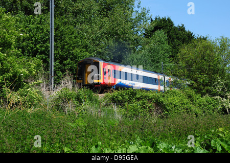 East Midlands Trains class 158 Express Sprinter DMU 158863 heading north from Ely, Cambridgeshire, England, UK Stock Photo