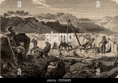Using a 'long tom' to wash for gold in the Californian gold fields.  The miners diverted the water courses, then dug out the ore-bearing sands which they washed for gold.  The Californian Gold Rush began in 1849.  From 'Underground Life; or, Mines and Miners' by Louis Simonin (London, 1869). Wood engraving. Stock Photo