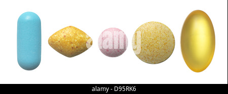 row of vitamins cut out onto a white background Stock Photo