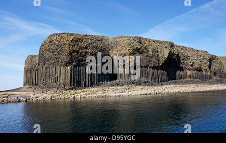 View from south east of the Isle of Staffa in the inner Hebrides of Scotland with Fingal's Cave centre Stock Photo