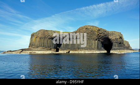 View from south of the Basalt Columns (colonnades) of Staffa in Inner Hebrides of Scotland with Fingal's Cave to the right Stock Photo