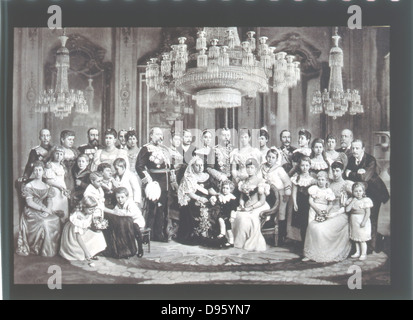 British royal family and its European connections - 1897. In centre is Queen Victoria surrounded by her children and their spouses, and by some of her numerous grandchildren. Victoria is seated with Alexandra, Princess of Wales. The Prince of Wales, later Edward VII, stands beside Queen Victoria. Photograph. Stock Photo