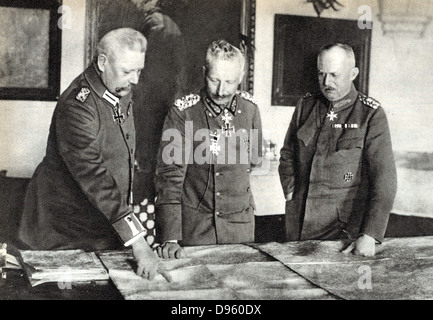 Wilhelm II Germany, centre, in the German High Command Headquarters with Field Marshal Paul von Hindenburg (left) and Quartermaster General Erich Ludendorff in January 1919. Stock Photo