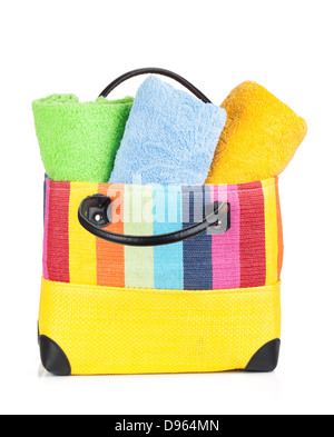 Beach bag with towels. Isolated on white background Stock Photo